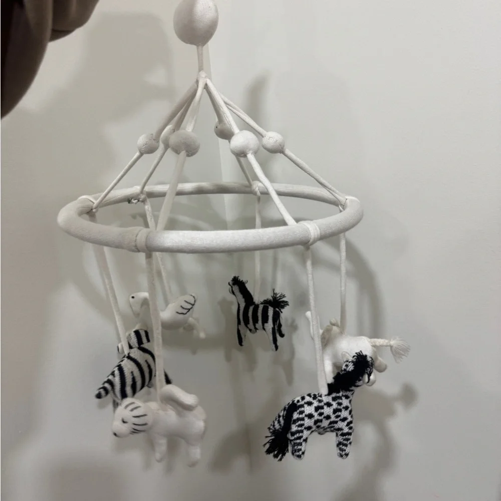 Crate & Barrel Baby Nursery safari animals mobile crib decor newborn neutral
